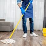 cleaning service mops floor